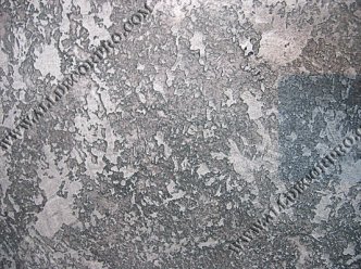 Панно на стене из декоративной металлизированной штукатурки