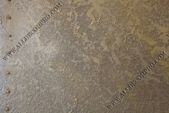 Стена декорированная панно из различных металлизированных декоративных штукатурок